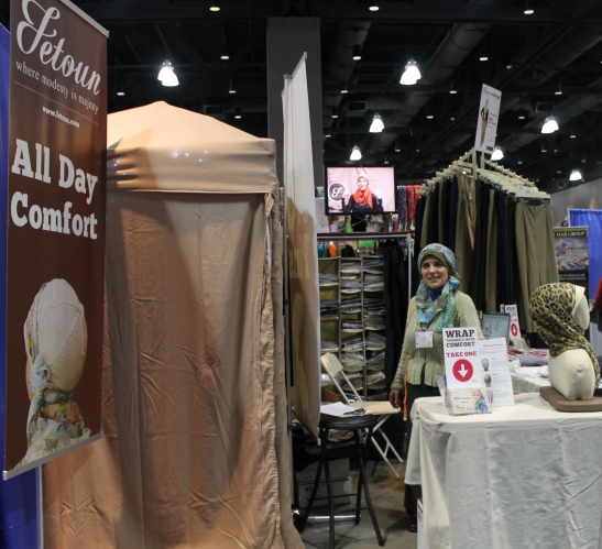  Faten Ramadan selling her no-pin headscarf during the Bazar at ICNA's regional  Convention, Connecticut Convention Center, Hartford, CT. Photo by Janan Zaitoun 